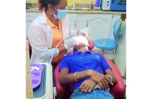 Dr Harrychan working on a patient