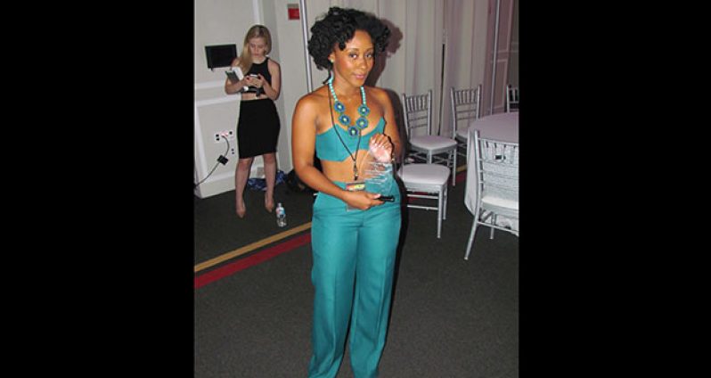 Keisha Edwards just after receiving the ‘Award of Excellence – Fashion Innovation’ at the 2016 Caribbean Style and Culture Awards in Maryland, USA.