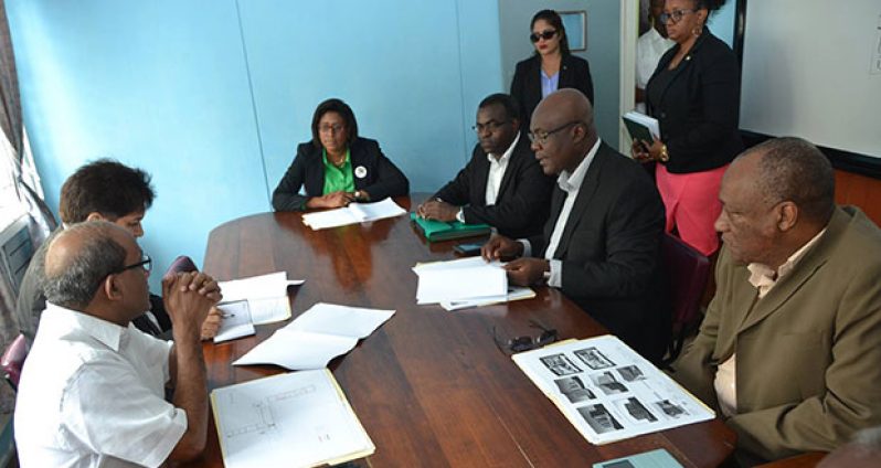 Minister of State, Joseph Harmon (right) pays rapt attention during discussion on the designs for the India-funded ICT Centre. Also in picture are: Minister of Public Telecommunications, Cathy Hughes, Advisor on E-Governance, Floyd Levi and Indian High Commissioner to Guyana, H.E Shri Venkatachalam Mahalingam 
(Ministry of the Presidency photo)