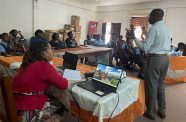 From left: Minister of Home Affairs, Hon. Robeson Benn, on the sidelines of the meeting with residents, in discussion with Deputy Commissioner Ravindradat Budhram, Regional Division Commander, Assistant Commissioner Khali Pareshram, and other officials