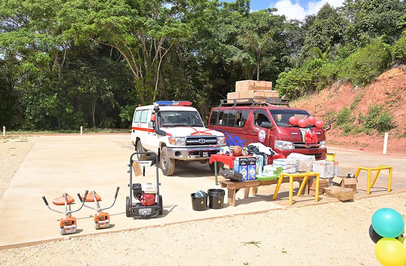 The new ambulance, bus, sports gear and other items which will benefit the residents of Matthews Ridge