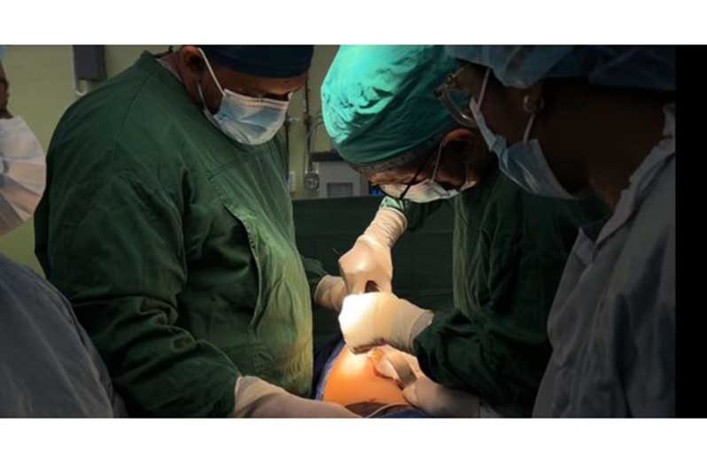 Dr Sheik Amir and team during a procedure