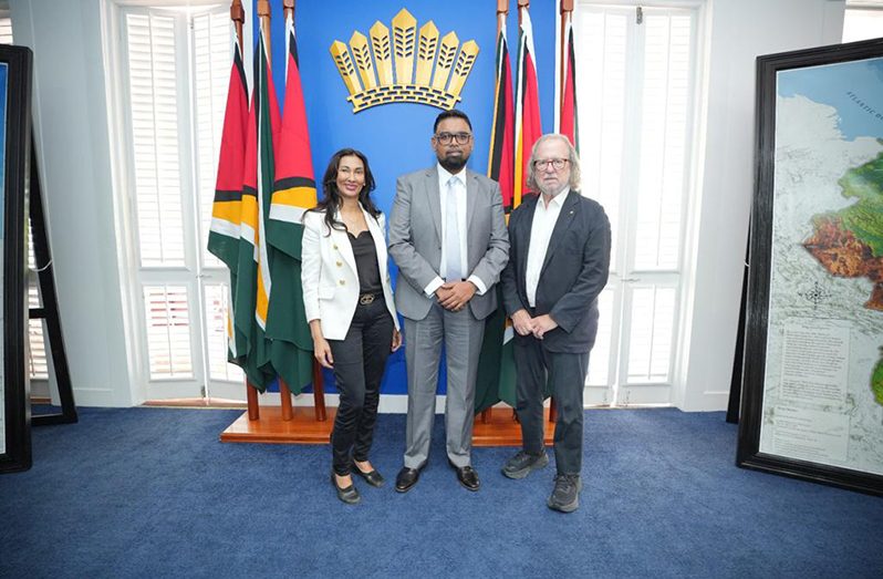 President, Dr Irfaan Ali (centre) with Professor Padmanee Sharma (left) and her husband Professor James Allison at State House (Office of the President photo)