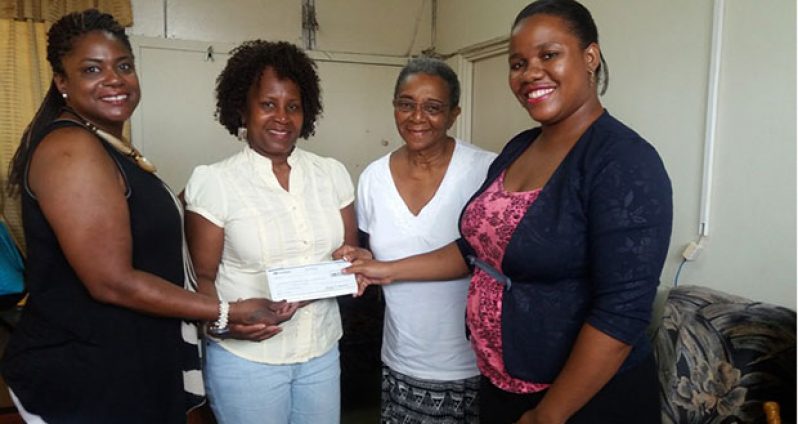 Members of the Baveghems family: From left: Rebecca Miskiri-Antoine, Delores Collins and Joycelyn Thompson. Also in picture is Daniella King (right), Assistant Registrar-Students’ Welfare, UG