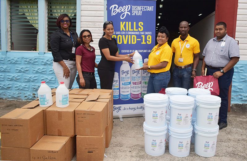 GPHC’s Quality Improvement Manager, Erwinettea Austin (third from right) receives the donation from Chief Executive Officer of DeSinco, Alicia De Abreu (Elvin Croker photo)