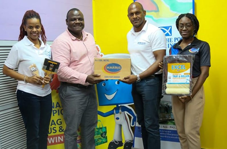 From right to left: Sidonia Peters - Logistics, Inventory and Human Resource Manager, Jameel Davis – Senior Manager of Gifts-in-Kind, Food for the Poor Guyana Inc., Nigel Dodson – Retail Services Manager at Harris Paints Guyana