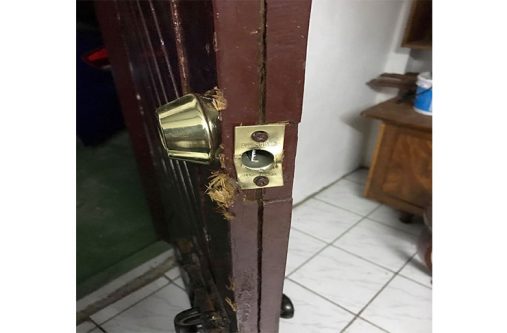 The door which was forced open by the burglar (s)