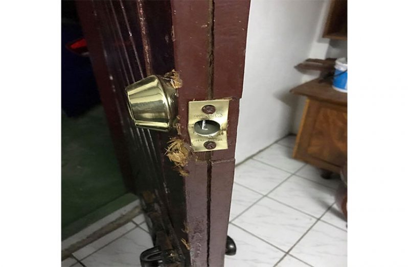 The door which was forced open by the burglar (s)