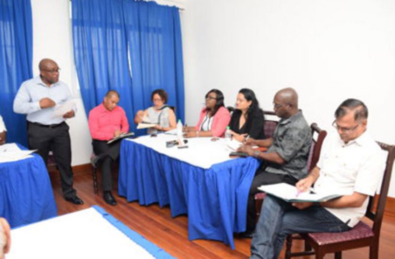 Chief Executive Officer of the New Amsterdam Regional Hospital, Colin Bynoe, briefing members of the Social Services Parliamentary Sectoral Committee