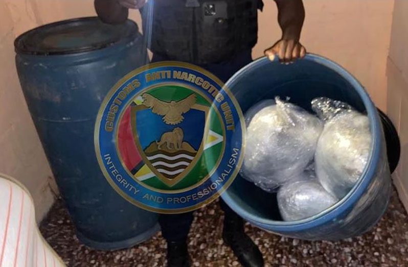 Some parcels of cannabis found in one of the barrels 