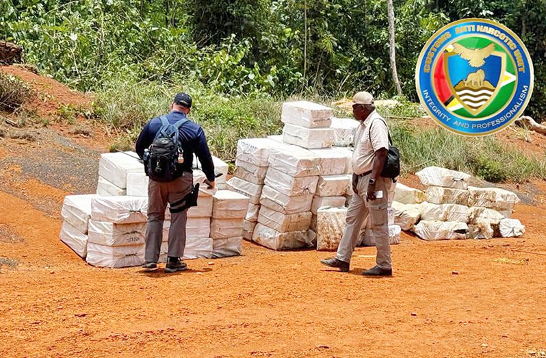 4.4 tonnes of cocaine valued €176,000,000 was discovered near an illegal airstrip in Region One on Saturday. Samples were taken before the narcotics were destroyed (CANU photos)