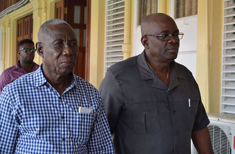 Embattled duo: Returning Officer for Region Four (Demerara-Mahaica), Clairmont Mingo (left) and Chief Elections Officer, Keith Lowenfield