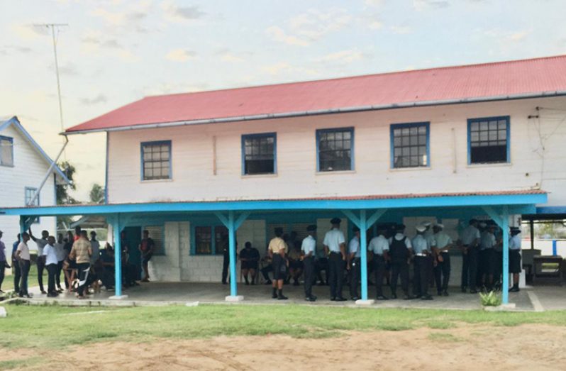 Officers at the Whim Police Station awaiting their turn to cast their ballot 