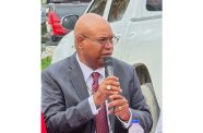 Minister Juan Edghill addresses Charity residents