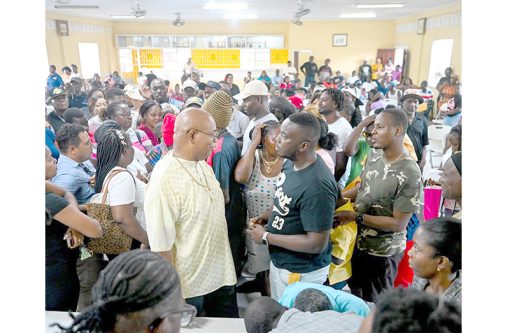 Minister of Public Works Bishop Juan Edghill engaging Buxtonians during a recent outreach (Ministry of Public Works photo)