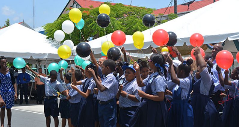 File photo of children of the Winfer Garden Primary School as they prepare to release their balloons into the air at the launch of education month yesterday
