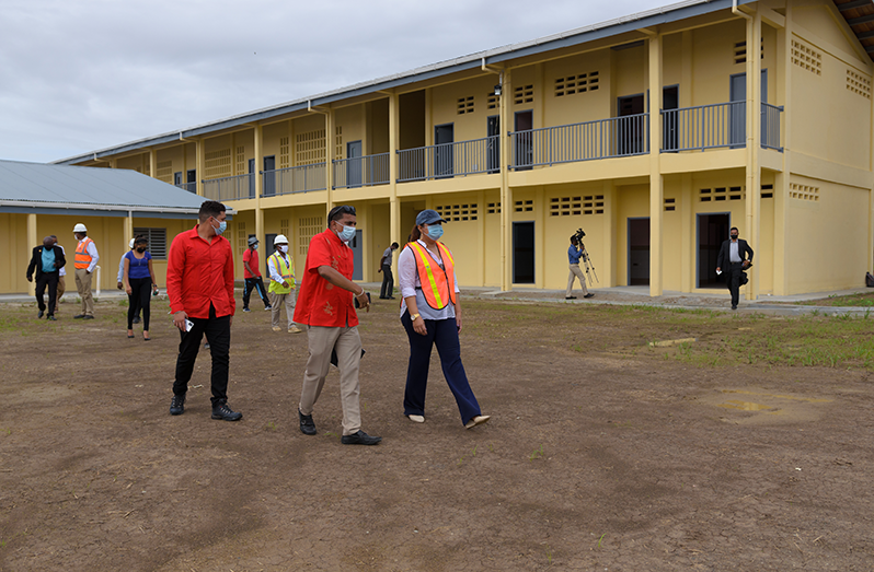 Education Minister, Priya Manickchand (right) and Region Three Regional Educational Officer, Devindra Persaud, inspecting the new Westminster Secondary School (Delano Williams photo)