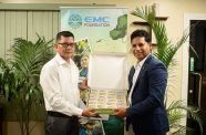 DCEO-Amerindian and Hinterland Education Development, Marti DeSouza, receives the donation from EMC Foundation founder and director, Shyam Nokta (EMC Foundation photo)