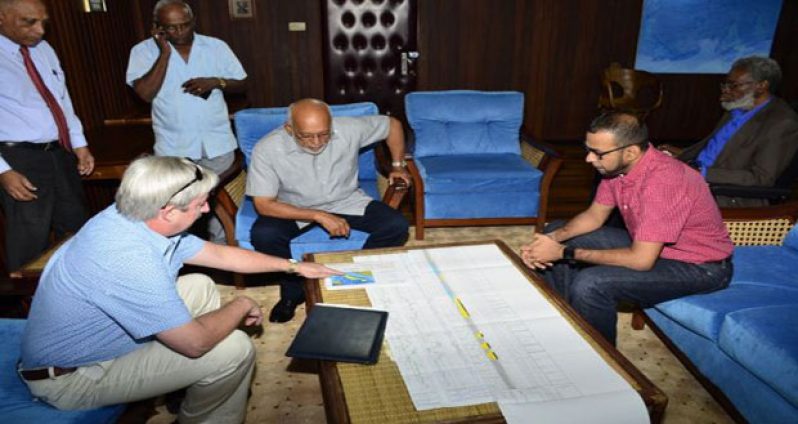 President Donald Ramotar, along with ESSO Country Manager Jeff Simon, Minister of Natural Resources and the Environment Minister Robert Persaud, Agriculture Minister Dr. Leslie Ramsammy and Cabinet Secretary Dr. Roger Luncheon during the meeting at the Office of the President 