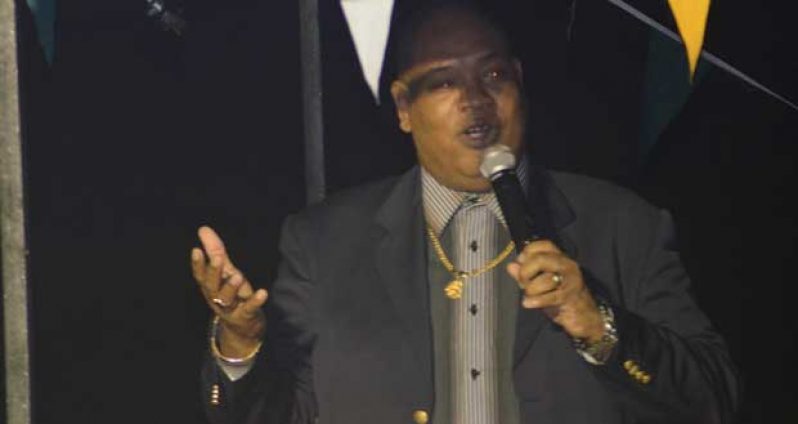 Minister within the Ministry of Finance, Juan Edghill speaking to the gathering at the event 
