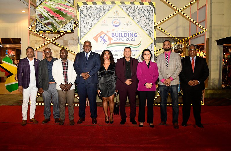 From left are: Minister within the Ministry of Public Works, Deodat Indar; Minister within the Office of the Prime Minister, Kwame McCoy; Prime Minister Brigadier (ret'd) Mark Phillips; Minister of Housing and Water, Collin Croal; Minister within the Ministry of Housing and Water, Susan Rodrigues; Permanent Secretary in the Ministry of Housing and Water, Andre Ally; Chairman of the Private Sector Commission Komal Singh and others at the launch of the exposition on Friday (Adrian Narine photo)