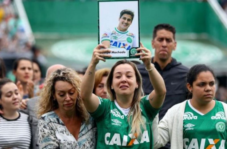 Fans and relatives took part in a funeral service at the Chapecoense stadium on Saturday.