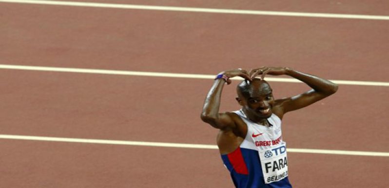 Mo Farah of Britain celebrates after winning the men's 10 000 metres final during the 15th IAAF World Championships at the National Stadium in Beijing, China, yesterday. (Reuters/Kim Kyung-Hoon)