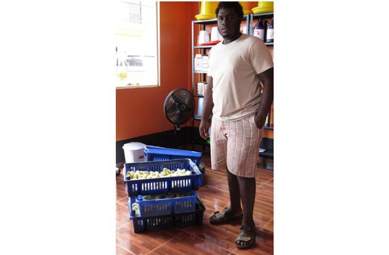 One of the livestock farmers with some chickens