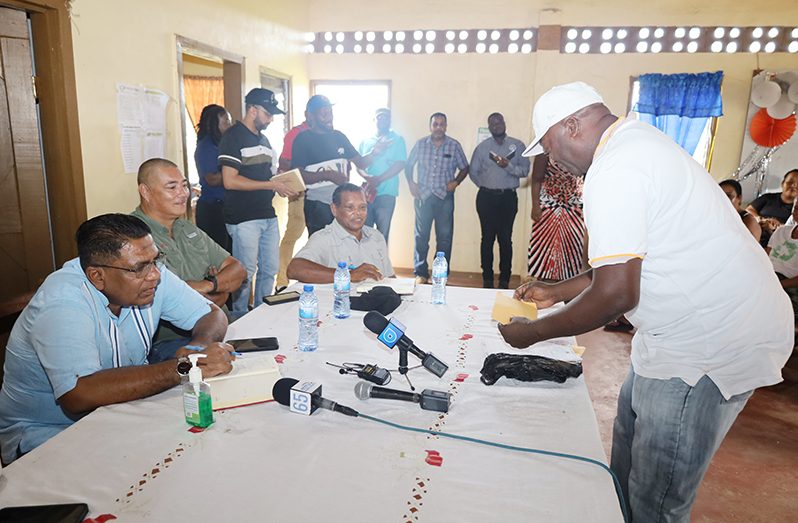 Minister Mustapha while engaging a farmer during the meeting