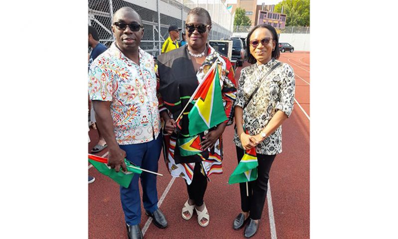 Minister McCoy and Minster Walrond pose for a photo with a member of the Brooklyn-New York diaspora