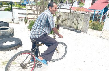 Murlie riding his bicycle