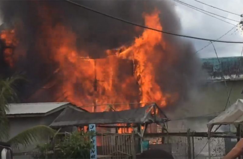 A screen grab of the building on fire.