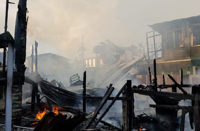 The smoldering remains of one homes at Bent Street. (Photos by: Jared Liddell)