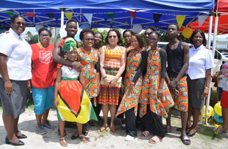 Smiling faces: First Lady, Mrs. Sandra Granger (centre), Divisional Director of the Women’s Ministries, Major Mireille Saint-Lot ( first, left), among other members of the Salvation Army and some youth who participated in cultural activities at  the annual Women Ministries Funfair