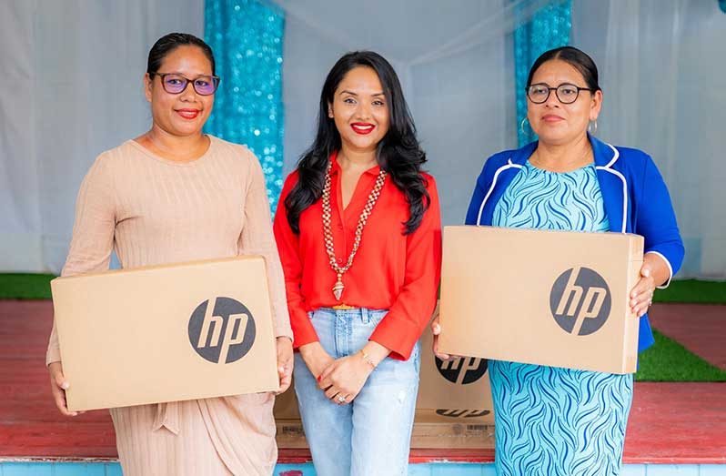 First Lady Arya Ali (centre) recently donated laptops to seven primary schools in Region One (Office of the First Lady photo)