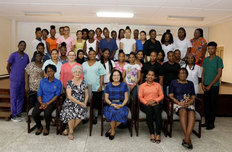 First Lady, Mrs. Sandra Granger (centre) and Director General of the Guyana Red Cross, Ms. Dorothy Fraser (second from left) facilitators and participants in the First Aid component of the Care for the Elderly Workshop