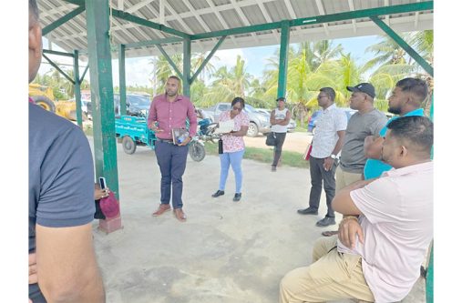 Regional Chairman Devin Mohan engaging fisherfolk at Hampton Court in Region Two