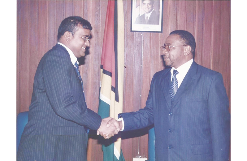 Flashback: Former People’s National Congress Reform (PNCR) leader and Opposition Leader Robert Herman Orlando Corbin and Dr Bharrat Jagdeo, who was Guyana’s President at the time  (Photos: Vice-president Bharrat Jagdeo/Facebook)