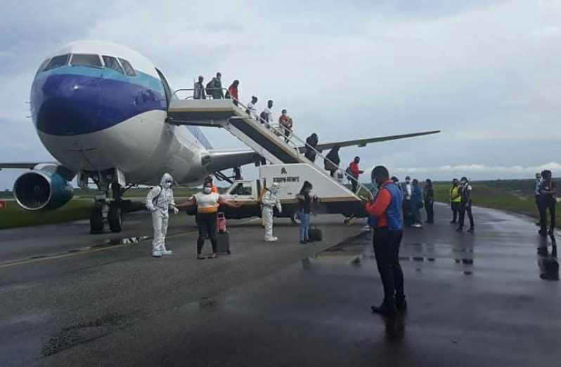 Guyanese disembark an Eastern Airlines flight from New York recently