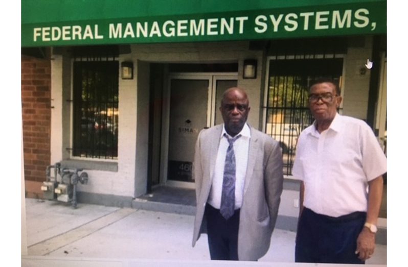 Buxtonian, Aubrey Stephenson, AA, (at left) with Bishop Seth Abbey, one of the benefactors of Federal Management Systems, outside the FMS office in Washington, DC, USA.  (Photo by Francis Quamina Farrier)