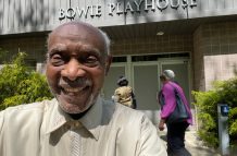 Francis Quamina Farrier at the Bowie Playhouse in Maryland, USA, as
two elderly ladies go by to the entrance of the playhouse