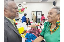 Ambassador to Guyana, Samuel A. Hinds and Guyanese Jacqueline Thompson(Photo by Francis Quamina Farrier)