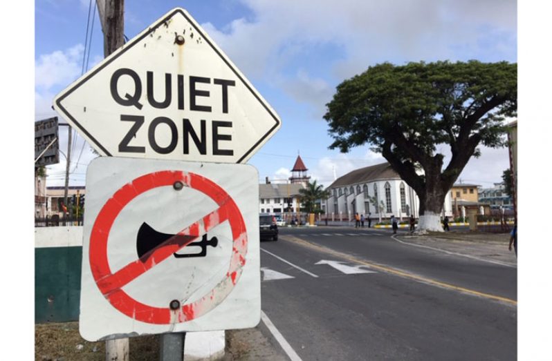 This "QUIET ZONE" sign is located on Brickdam at High Street; one of the noisiest areas of the city. (Photo by Francis Q. Farrier)