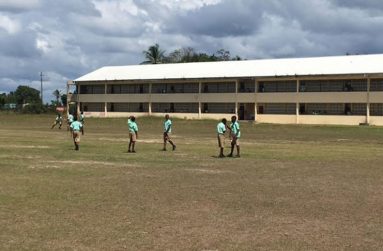 The Wisburg Secondary School playfield which was all white sand 10 years ago