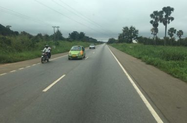 A stretch of the hundreds of miles of previous dirt roads all over Ghana. Traffic is "keep right". (Photo by F.Q. Farrier, October 2018)