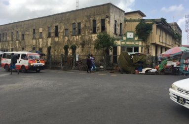 "The Guyana National Cooperative Bank" (GNCB) is now a missing name in Guyana, with the former Head Bank in Georgetown closed and rotting away and shrubs growing on it (Photo by F. Q. Farrier)