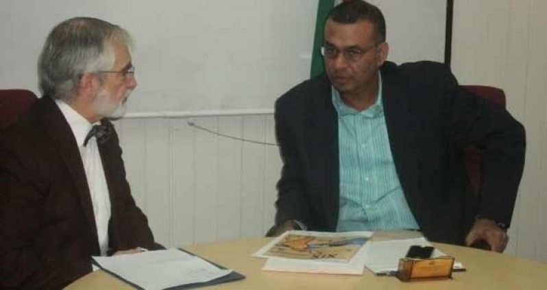 Minister of Natural Resources and the Environment, Robert Persaud and Mexican Ambassador to Guyana, Francisco Olguin during a discussion at the Ministry of Natural Resources and the Environment