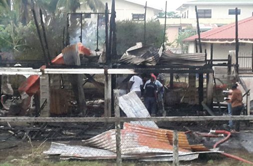 This is what remains of the burnt house from which Leonard Pollard, 36, Latoya Telford, 26, and their 18-month-old baby Nakasia Pollard were pulled at Beterverwagting, East Coast Demerara early Sunday morning