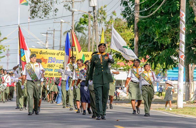 Director of the Seventh-day Adventist youth arm, Marvyn Smith leads a march to the Adventist Village at the Sophia Exhibition Complex. The march was part of
activities to celebrate 130 years of Seventh-day Adventism in Guyana (Samuel Maughn photo)