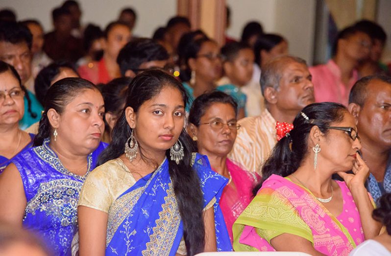 A section of the gathering at a prayer and appreciation ceremony at the International Society for Krishna Consciousness
(ISKCON) local headquarters in Cummings Lodge, Greater Georgetown on Sunday (Samuel Maughn photo)